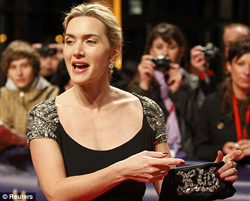 Kate Winslet carries a black jeweled clutch. Photo from Daily Mail.