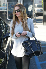 Lindsay Lohan will be designing handbags for Ed Hardy soon enough.